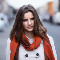 Unhappy wife. Angry woman outside in the city of Brussels Belgium looking at you camera children husband about to yell scold